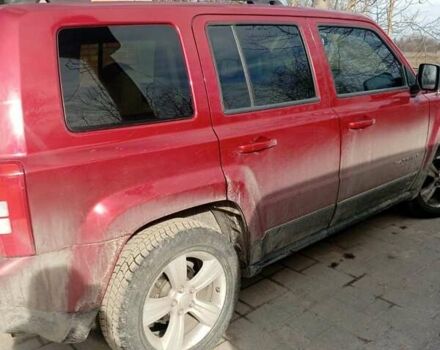 Червоний Джип Patriot, об'ємом двигуна 2.4 л та пробігом 104 тис. км за 8995 $, фото 2 на Automoto.ua