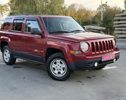Красный Джип Патриот, объемом двигателя 2.4 л и пробегом 157 тыс. км за 9999 $, фото 1 на Automoto.ua