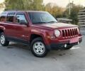 Красный Джип Патриот, объемом двигателя 2.4 л и пробегом 157 тыс. км за 9999 $, фото 1 на Automoto.ua