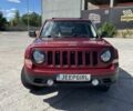 Червоний Джип Patriot, об'ємом двигуна 2.4 л та пробігом 253 тис. км за 8900 $, фото 1 на Automoto.ua