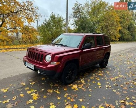 Красный Джип Патриот, объемом двигателя 2 л и пробегом 270 тыс. км за 9500 $, фото 5 на Automoto.ua