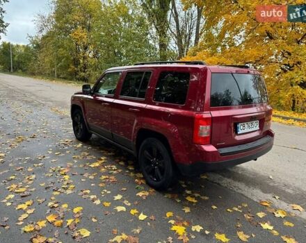 Красный Джип Патриот, объемом двигателя 2 л и пробегом 270 тыс. км за 9500 $, фото 4 на Automoto.ua