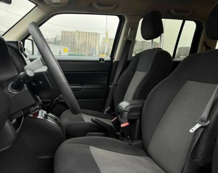 Красный Джип Патриот, объемом двигателя 2.4 л и пробегом 161 тыс. км за 8750 $, фото 6 на Automoto.ua