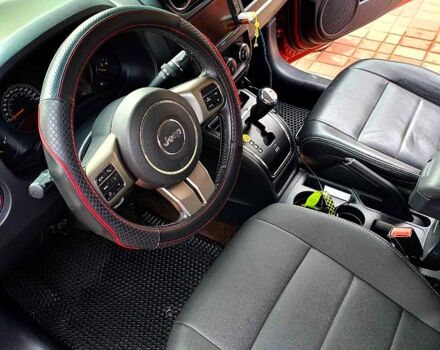 Червоний Джип Patriot, об'ємом двигуна 2.4 л та пробігом 124 тис. км за 10700 $, фото 5 на Automoto.ua