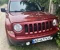 Красный Джип Патриот, объемом двигателя 2 л и пробегом 100 тыс. км за 12000 $, фото 1 на Automoto.ua