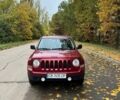 Красный Джип Патриот, объемом двигателя 2 л и пробегом 270 тыс. км за 9500 $, фото 1 на Automoto.ua