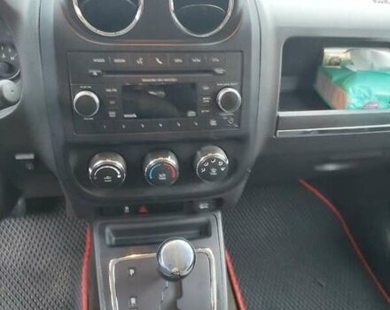 Красный Джип Патриот, объемом двигателя 2 л и пробегом 150 тыс. км за 8000 $, фото 4 на Automoto.ua