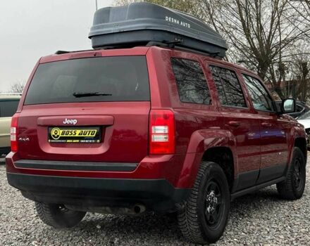 Красный Джип Патриот, объемом двигателя 2.4 л и пробегом 161 тыс. км за 8750 $, фото 5 на Automoto.ua
