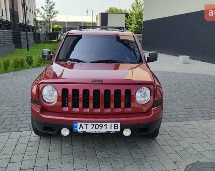 Красный Джип Патриот, объемом двигателя 2 л и пробегом 182 тыс. км за 11500 $, фото 1 на Automoto.ua