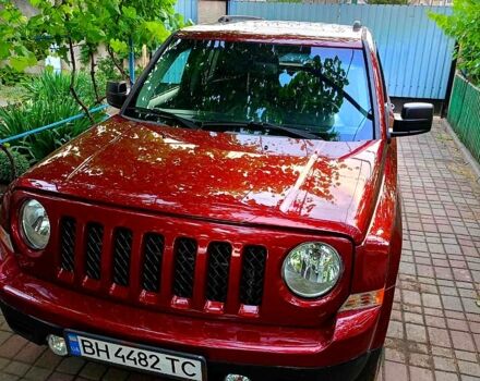 Червоний Джип Patriot, об'ємом двигуна 2.4 л та пробігом 124 тис. км за 10700 $, фото 1 на Automoto.ua