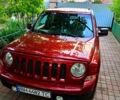 Червоний Джип Patriot, об'ємом двигуна 2.4 л та пробігом 124 тис. км за 10700 $, фото 1 на Automoto.ua