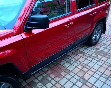 Червоний Джип Patriot, об'ємом двигуна 2.4 л та пробігом 124 тис. км за 10700 $, фото 2 на Automoto.ua