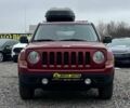 Красный Джип Патриот, объемом двигателя 2.4 л и пробегом 161 тыс. км за 8750 $, фото 1 на Automoto.ua
