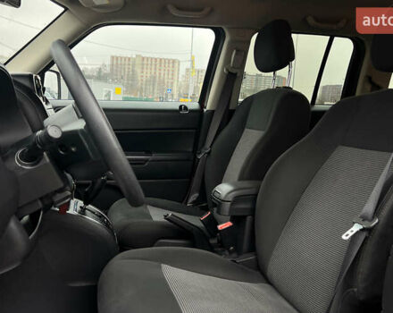 Красный Джип Патриот, объемом двигателя 2.36 л и пробегом 161 тыс. км за 8750 $, фото 6 на Automoto.ua