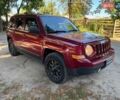 Червоний Джип Patriot, об'ємом двигуна 2 л та пробігом 101 тис. км за 10490 $, фото 2 на Automoto.ua