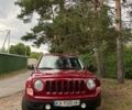 Красный Джип Патриот, объемом двигателя 2 л и пробегом 203 тыс. км за 11500 $, фото 1 на Automoto.ua