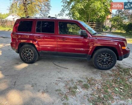 Червоний Джип Patriot, об'ємом двигуна 2 л та пробігом 101 тис. км за 10490 $, фото 3 на Automoto.ua