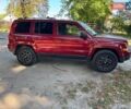 Червоний Джип Patriot, об'ємом двигуна 2 л та пробігом 101 тис. км за 10490 $, фото 3 на Automoto.ua