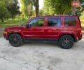 Червоний Джип Patriot, об'ємом двигуна 2 л та пробігом 101 тис. км за 10490 $, фото 7 на Automoto.ua