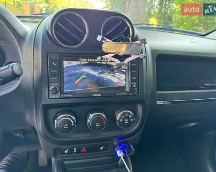 Червоний Джип Patriot, об'ємом двигуна 2 л та пробігом 101 тис. км за 10490 $, фото 13 на Automoto.ua