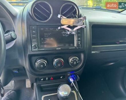 Червоний Джип Patriot, об'ємом двигуна 2 л та пробігом 101 тис. км за 10490 $, фото 12 на Automoto.ua