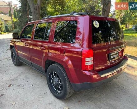 Червоний Джип Patriot, об'ємом двигуна 2 л та пробігом 101 тис. км за 10490 $, фото 6 на Automoto.ua