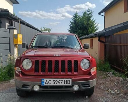 Красный Джип Патриот, объемом двигателя 2 л и пробегом 160 тыс. км за 8900 $, фото 1 на Automoto.ua