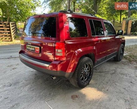 Червоний Джип Patriot, об'ємом двигуна 2 л та пробігом 101 тис. км за 10490 $, фото 4 на Automoto.ua
