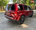 Червоний Джип Patriot, об'ємом двигуна 2 л та пробігом 101 тис. км за 10490 $, фото 4 на Automoto.ua