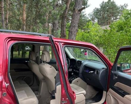 Красный Джип Патриот, объемом двигателя 2 л и пробегом 203 тыс. км за 11500 $, фото 5 на Automoto.ua