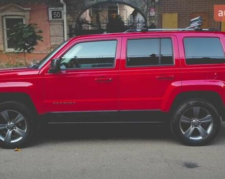 Красный Джип Патриот, объемом двигателя 2.36 л и пробегом 170 тыс. км за 12500 $, фото 2 на Automoto.ua