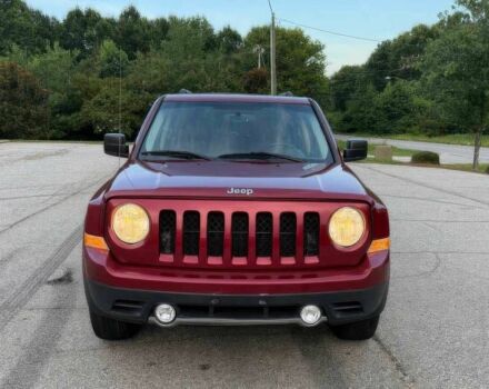 Красный Джип Патриот, объемом двигателя 2.4 л и пробегом 57 тыс. км за 7800 $, фото 1 на Automoto.ua