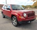 Красный Джип Патриот, объемом двигателя 2.4 л и пробегом 59 тыс. км за 4600 $, фото 1 на Automoto.ua