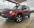 Червоний Джип Patriot, об'ємом двигуна 2 л та пробігом 117 тис. км за 4500 $, фото 1 на Automoto.ua