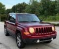 Красный Джип Патриот, объемом двигателя 2.4 л и пробегом 57 тыс. км за 7800 $, фото 1 на Automoto.ua