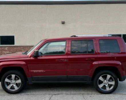 Красный Джип Патриот, объемом двигателя 2.4 л и пробегом 57 тыс. км за 7800 $, фото 3 на Automoto.ua