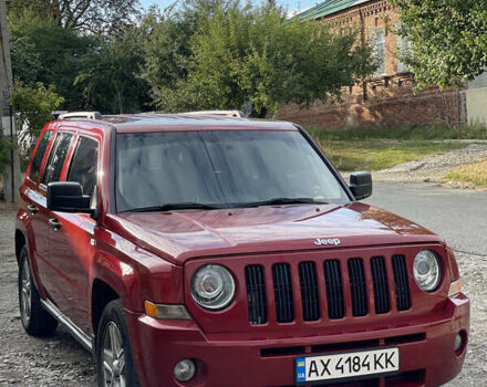 Красный Джип Патриот, объемом двигателя 2.36 л и пробегом 210 тыс. км за 8500 $, фото 1 на Automoto.ua