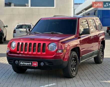 Красный Джип Патриот, объемом двигателя 2.4 л и пробегом 181 тыс. км за 8440 $, фото 1 на Automoto.ua