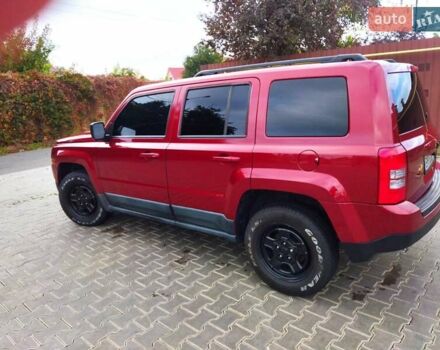 Красный Джип Патриот, объемом двигателя 2.36 л и пробегом 180 тыс. км за 8800 $, фото 1 на Automoto.ua