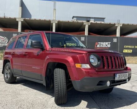 Червоний Джип Patriot, об'ємом двигуна 2.4 л та пробігом 253 тис. км за 8900 $, фото 1 на Automoto.ua