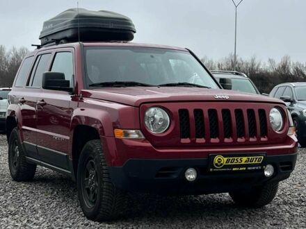 Красный Джип Патриот, объемом двигателя 2.4 л и пробегом 161 тыс. км за 8750 $, фото 1 на Automoto.ua