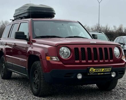 Красный Джип Патриот, объемом двигателя 2.4 л и пробегом 161 тыс. км за 8750 $, фото 1 на Automoto.ua