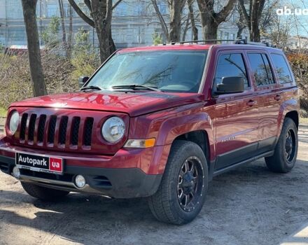 Червоний Джип Patriot, об'ємом двигуна 2 л та пробігом 101 тис. км за 12390 $, фото 1 на Automoto.ua