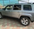 Серый Джип Патриот, объемом двигателя 2.4 л и пробегом 86 тыс. км за 12000 $, фото 1 на Automoto.ua