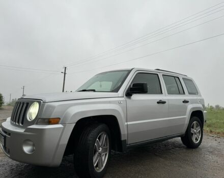Серый Джип Патриот, объемом двигателя 2.4 л и пробегом 322 тыс. км за 5600 $, фото 1 на Automoto.ua