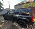 Серый Джип Патриот, объемом двигателя 2.4 л и пробегом 150 тыс. км за 10000 $, фото 1 на Automoto.ua