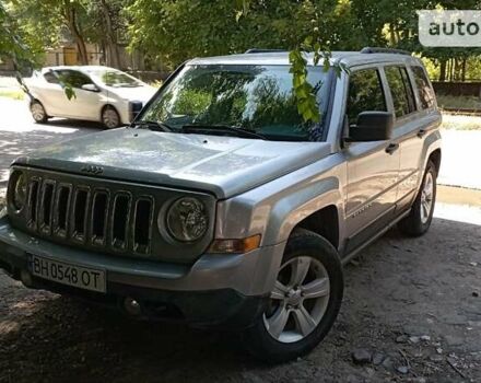 Серый Джип Патриот, объемом двигателя 2.4 л и пробегом 214 тыс. км за 9999 $, фото 1 на Automoto.ua