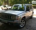 Серый Джип Патриот, объемом двигателя 2.4 л и пробегом 214 тыс. км за 9999 $, фото 1 на Automoto.ua