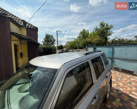 Серый Джип Патриот, объемом двигателя 2.36 л и пробегом 134 тыс. км за 10000 $, фото 1 на Automoto.ua