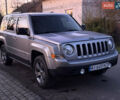 Серый Джип Патриот, объемом двигателя 2.4 л и пробегом 143 тыс. км за 12600 $, фото 1 на Automoto.ua
